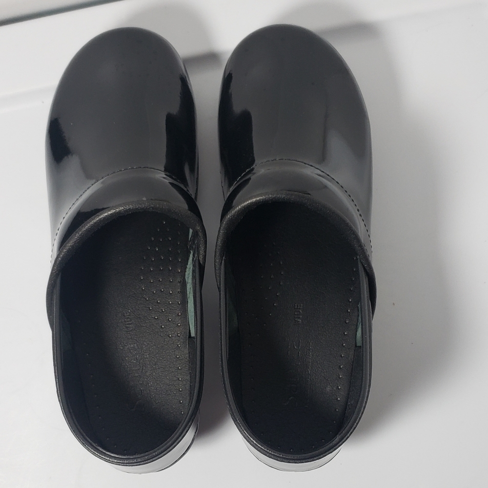sanita black patent leather clogs